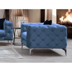 Fåtölj i blå sammet