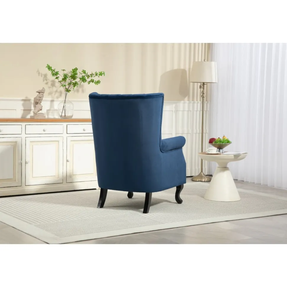 Öronlappsfåtölj i blått sammet