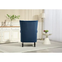 Öronlappsfåtölj i blått sammet