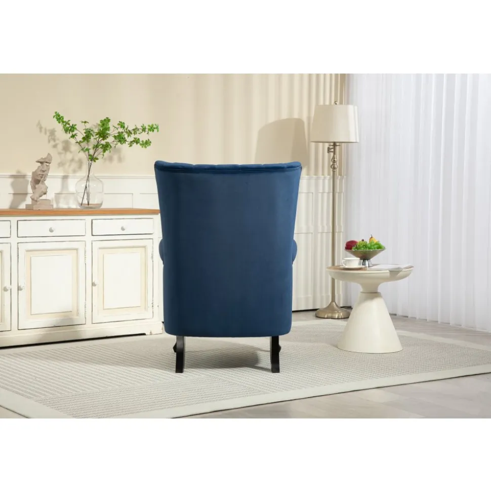 Öronlappsfåtölj i blått sammet