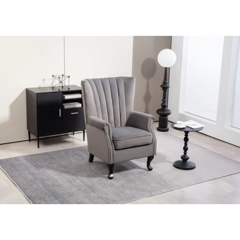 Öronlappsfåtölj i grått sammet