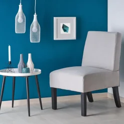 Tarben fåtölj i ljusgrått sammet