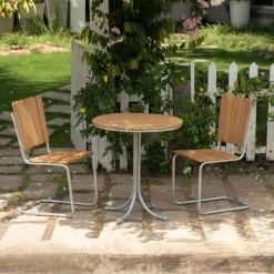 Teakstol med galvat stål, stapelbar - Möllan + Rengöringsmedel för utemöbler